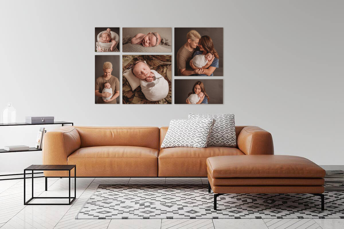 Brown modern leather couch with low back and ottoman on black and white rug in living room with white walls and beautiful canvas portrait wall art behind couch.