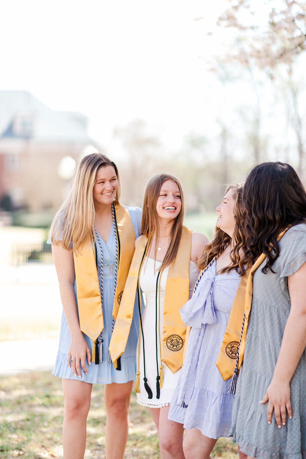 Laughing group photos of graduating seniors