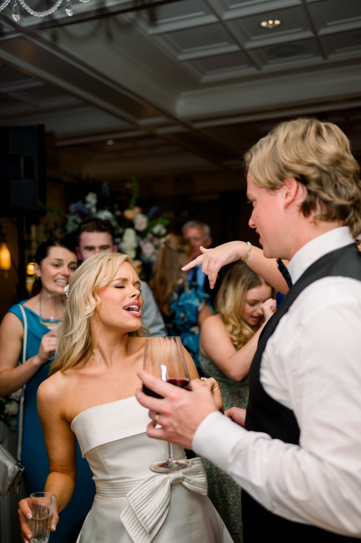 Bride dancing with groom at wedding reception at University Club in Alabama
