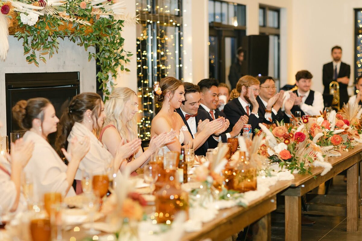 Bridal party enjoying dinner at a wedding at North Star Gatherings.