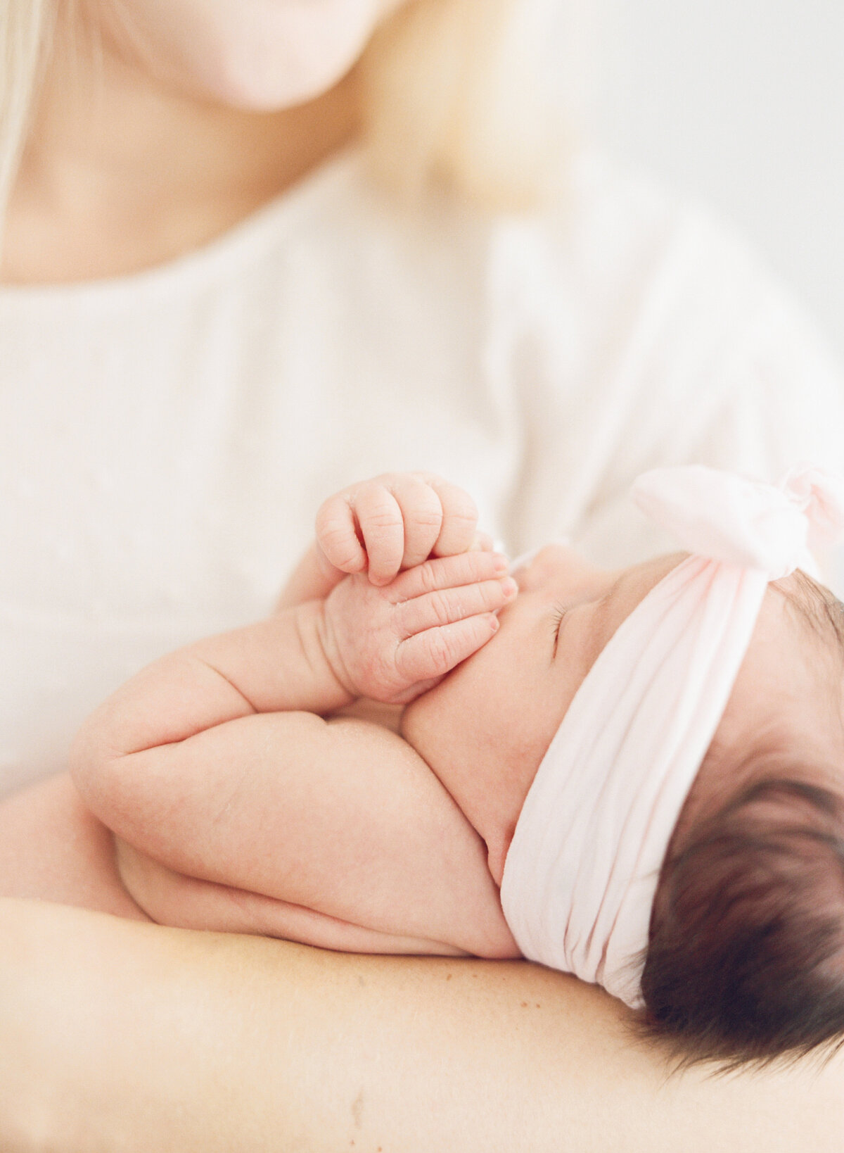 Close up of baby fingers. Image by Raleigh newborn photographer A.J. Dunlap Photography.