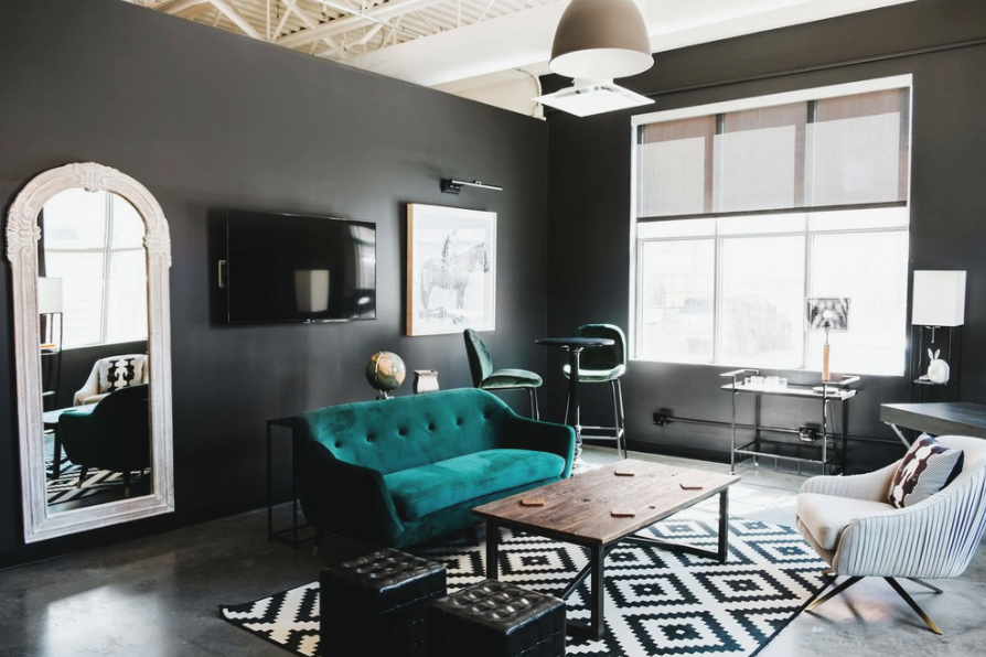 Moody sitting area at The Brownstone, modern and elegant Calgary, Alberta wedding venue, featured on the Brontë Bride Vendor Guide.