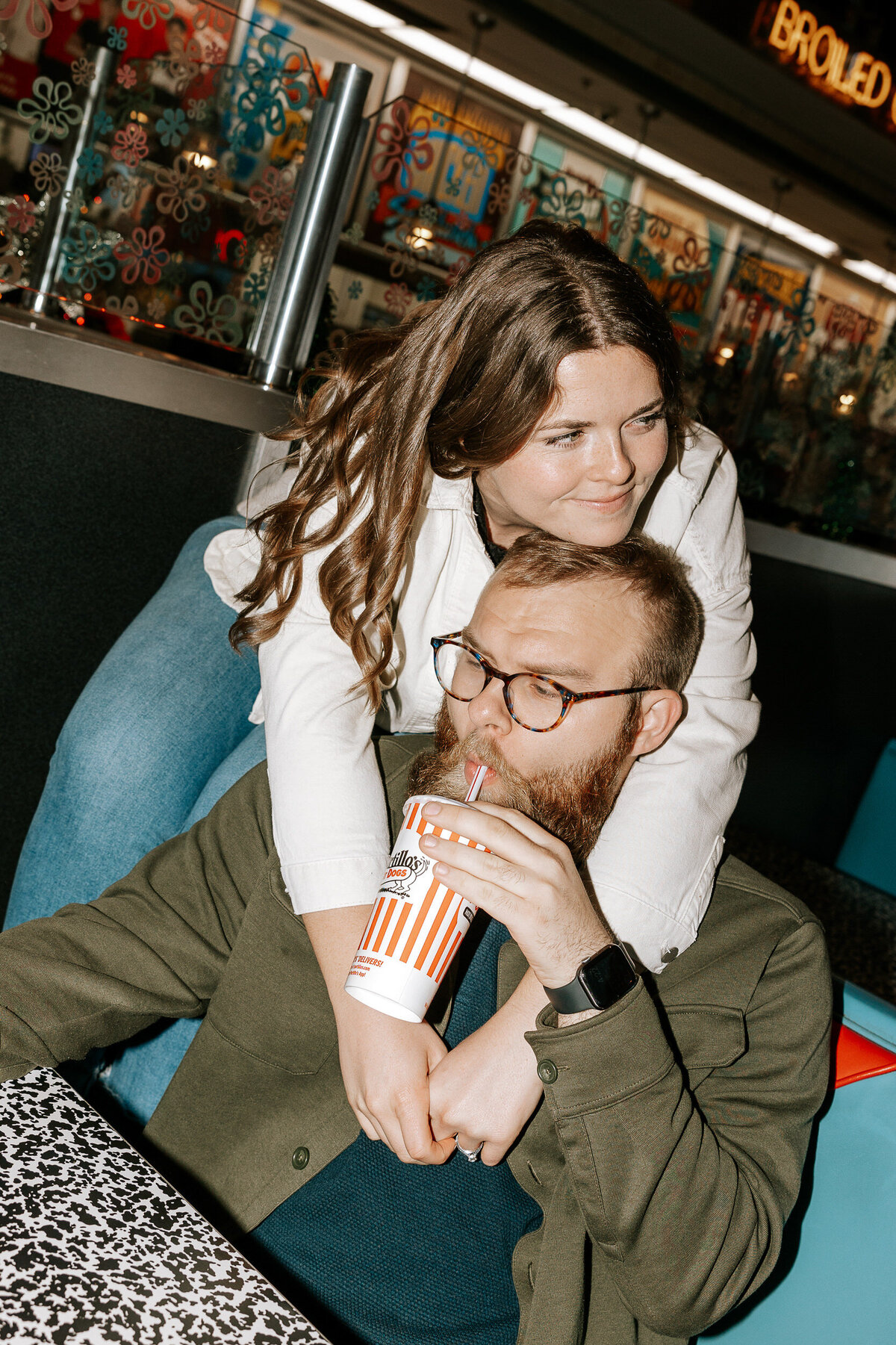 creative fun chicago flash engagement photos at Portillos Hotdogs-39-ed-lucy