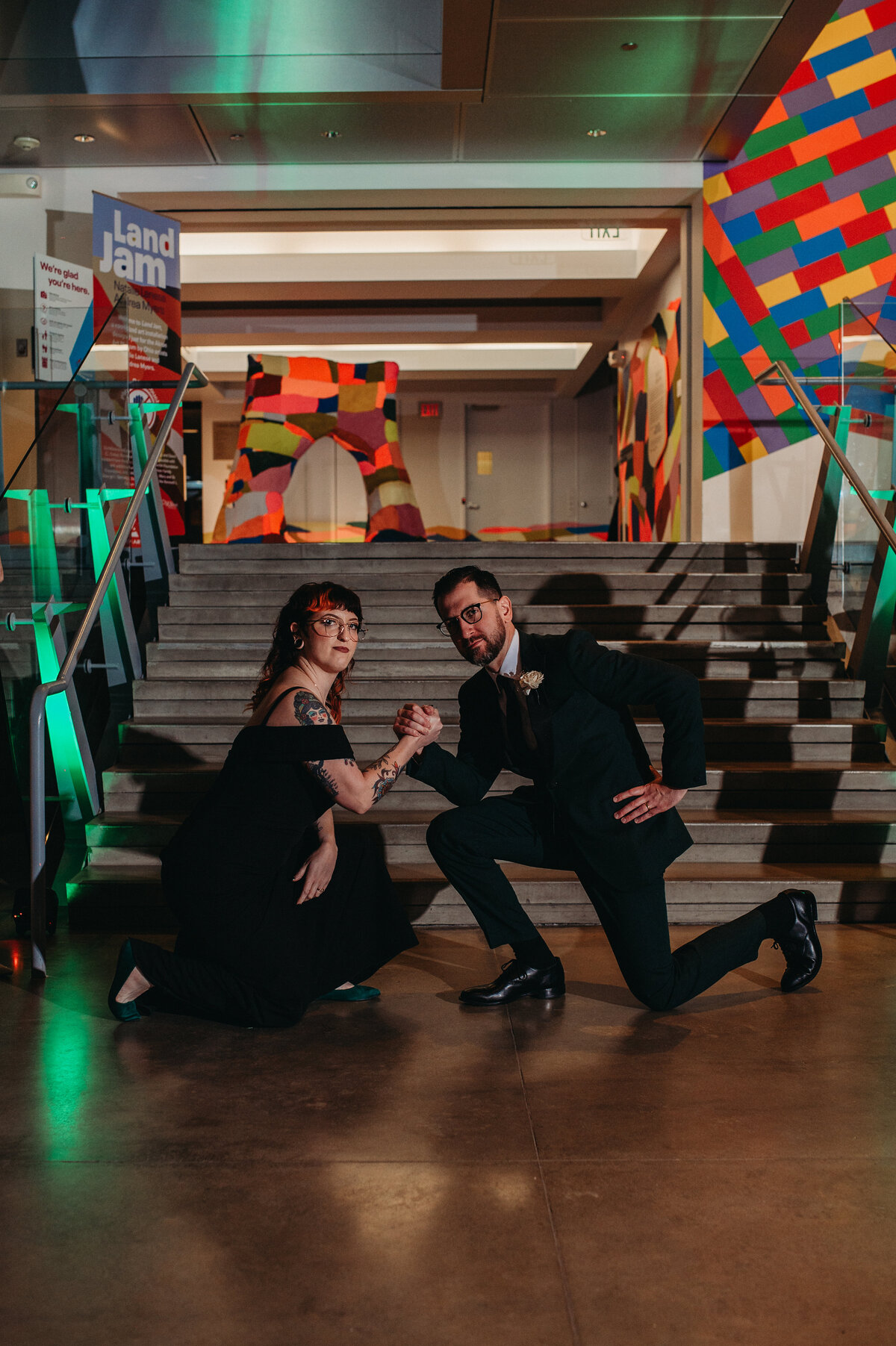 Bride and groom go into a hardstyle pose as they enter their reception in Akron Ohio