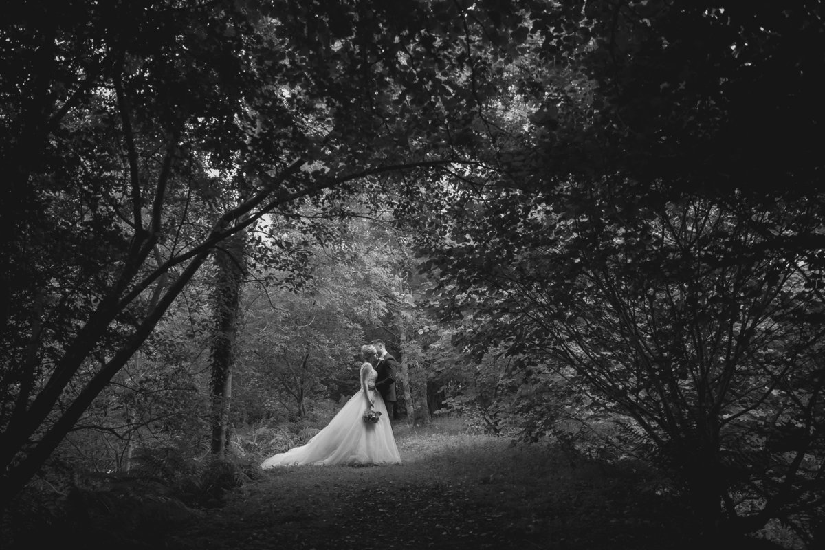 Black and white woodland wedding photo at The Green in Cornwall