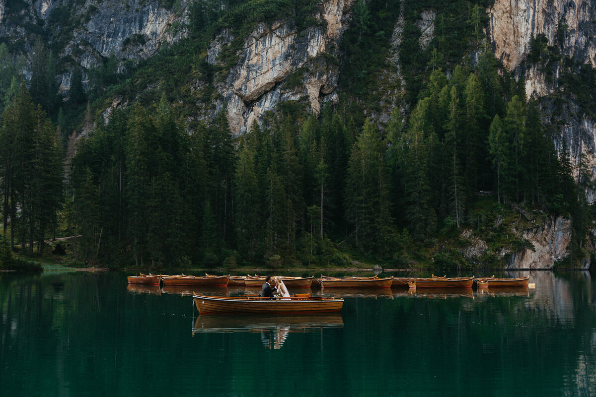 Scenic view of Lago di Braies docks surrounded by mountains