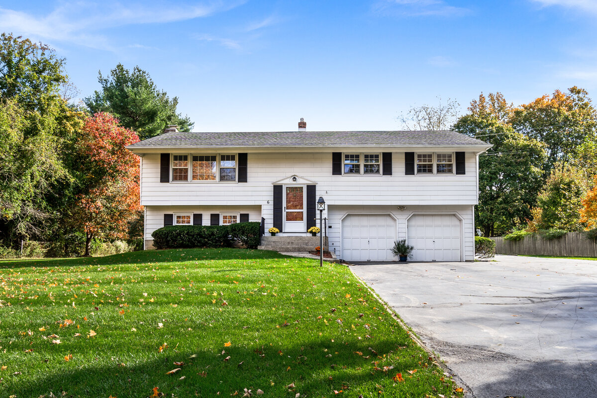 White Split Level Home with Black Shutters in West Windsor, NJ