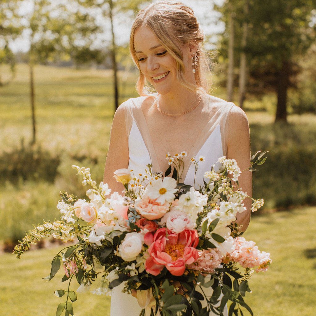 Large garden bridal bouquet with peony and cosmos