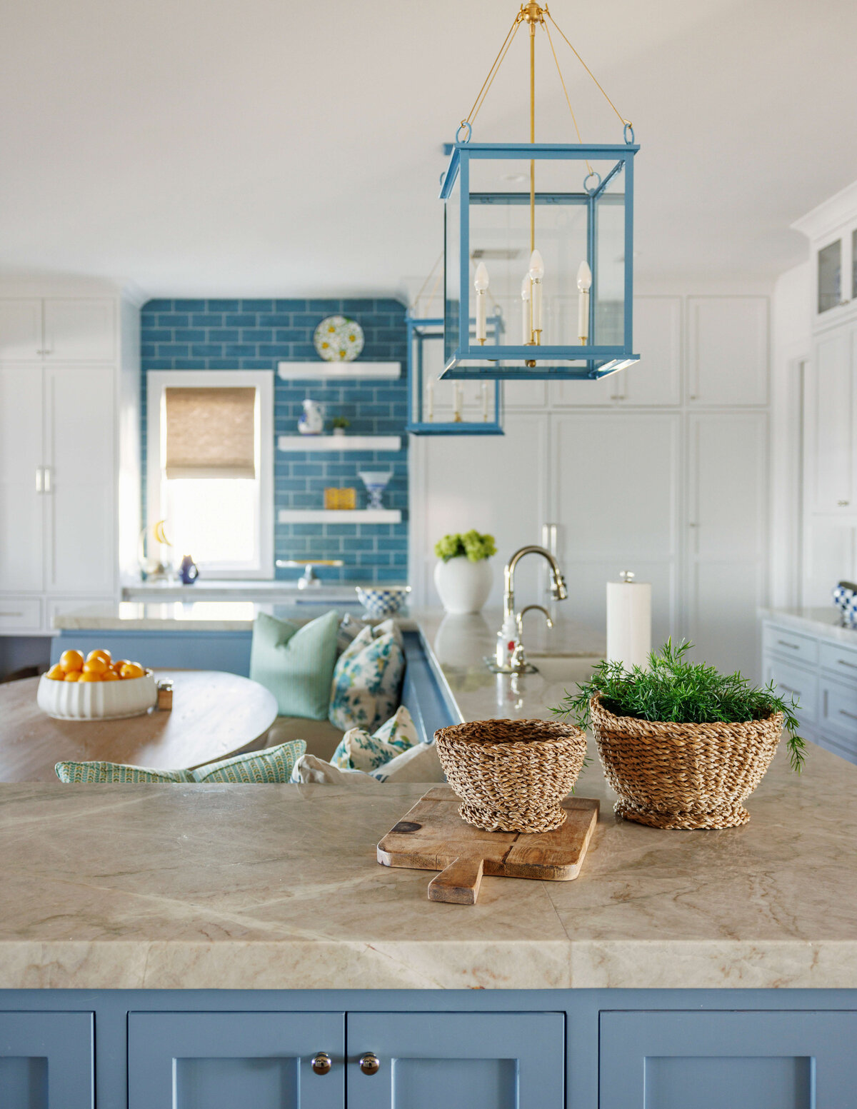oyster creek studios lighthouse on the lake light blue kitchen with brown marble counters and blue tile