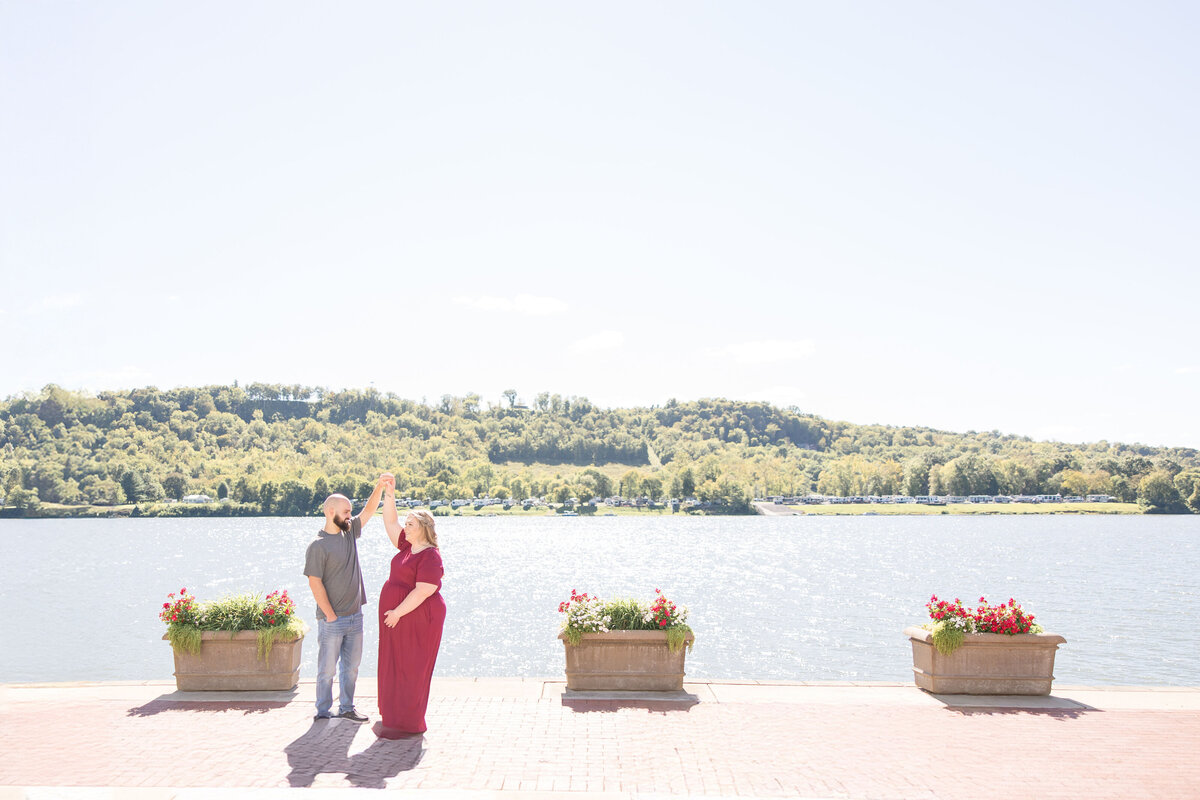 Maternity session on the Ohio River in Ripley, Ohio. Husband twirling wife.