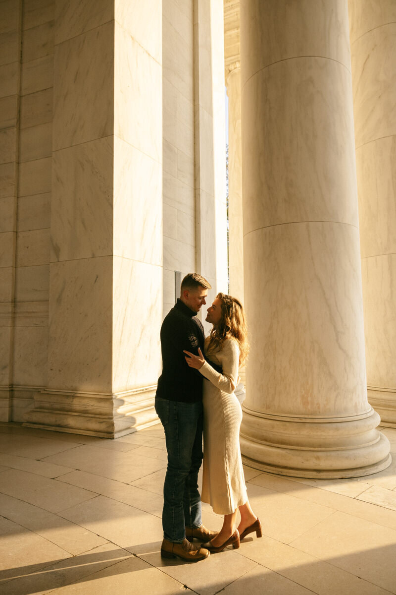 A sunrise engagement session at the Jefferson Memorial