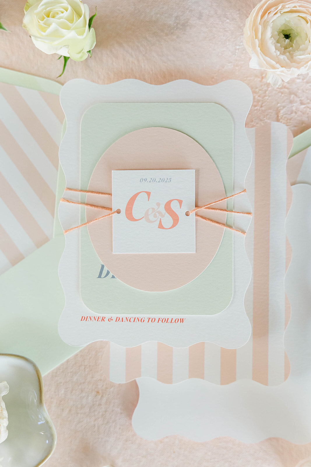 layered-wedding-invite-suite-with-scalloped-edges-flatlay