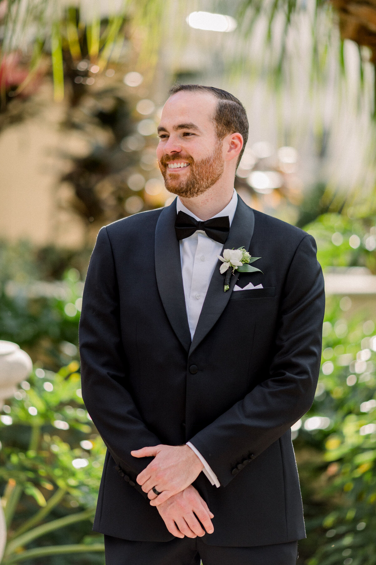 Sarasota Ritz Carlton Wedding groom in the Healing Garden