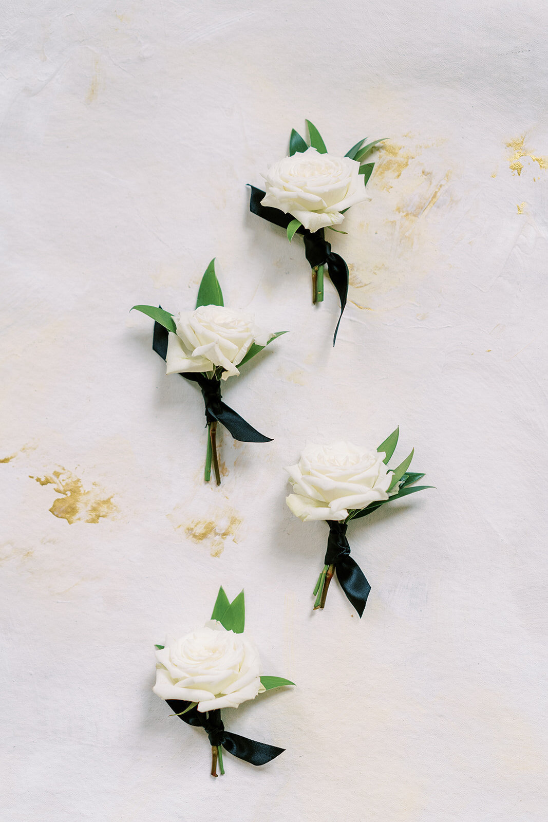 white-rose-bouttonieres