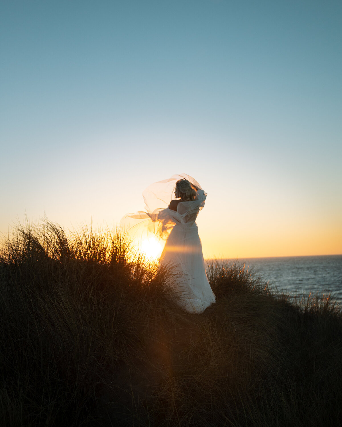 Bride at sunset on the beach
