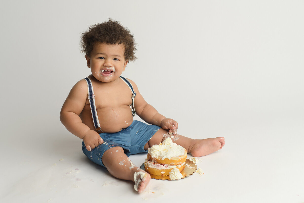 one year old with strawberry shortcake