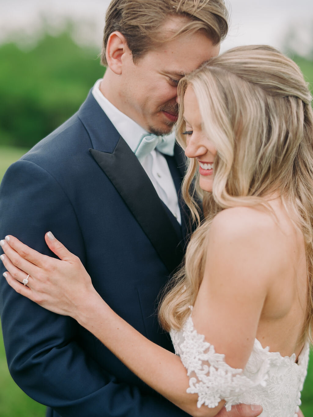 Bride and groom hugging each other