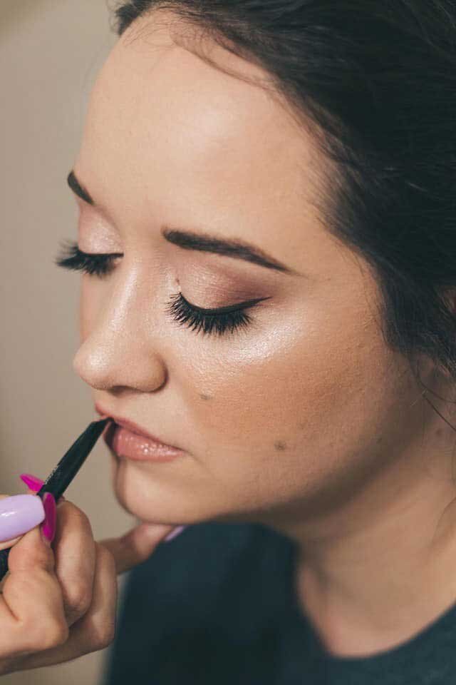 Florida bride getting eye makeup