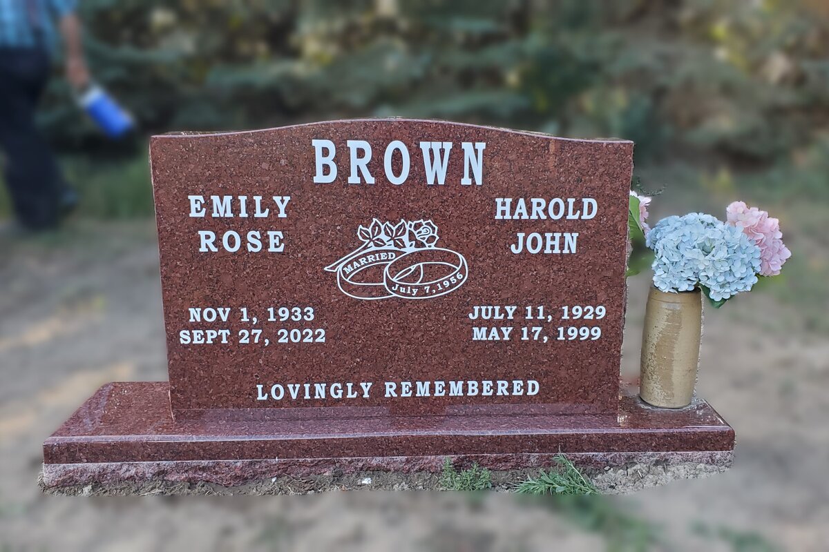 red granite headstone with engraving