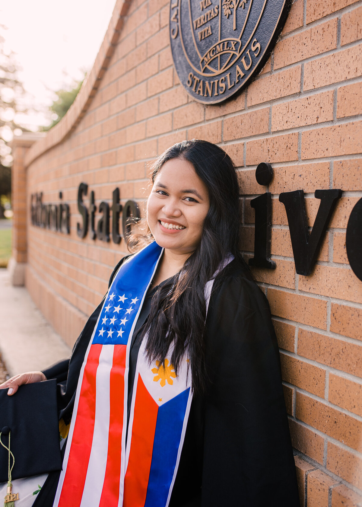 Female-Stan-State-Graduates-Golden-Hour-Turlock-California