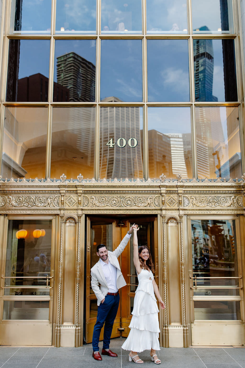 An engagement photography session at The Wrigley Building and North Ave Beach in Chicago, Illinois - 9