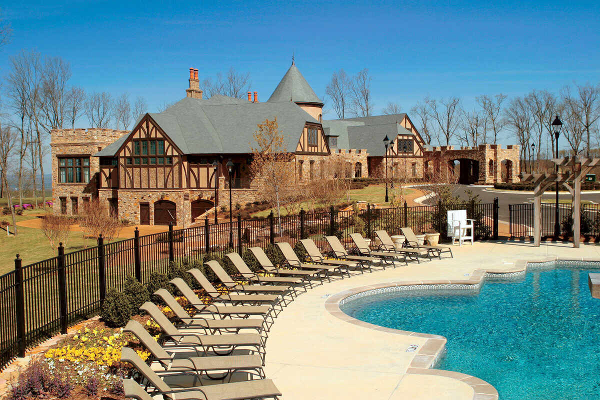 view over the swimming pool looking at the clubhouse at The Ledges country club