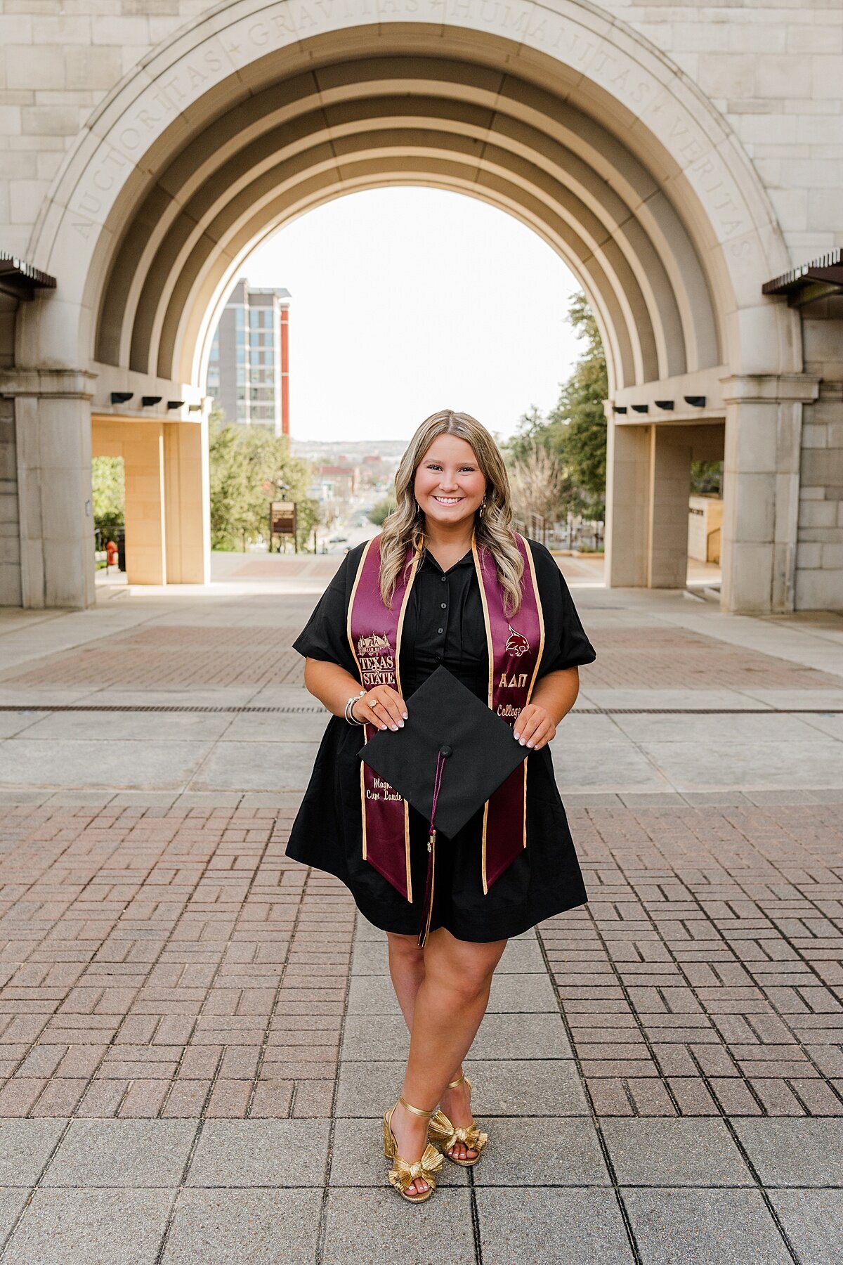 Texas State University Photoshoot Girl posing at the arch 
