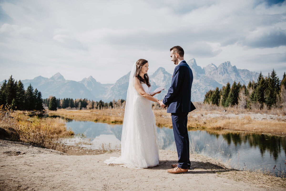 Photographers Jackson Hole capture bride reading vows