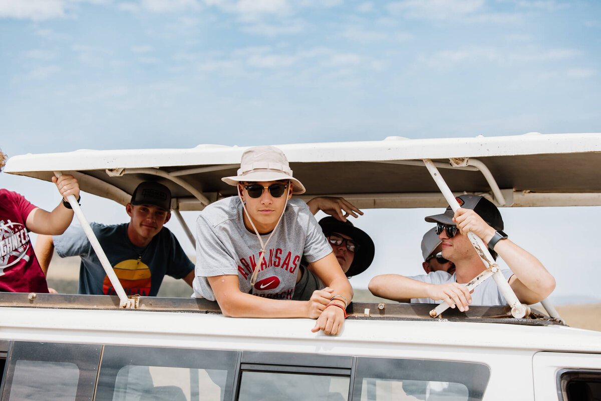 Riding through the Maasai Mara National Park in an open top van in Kenya Africa