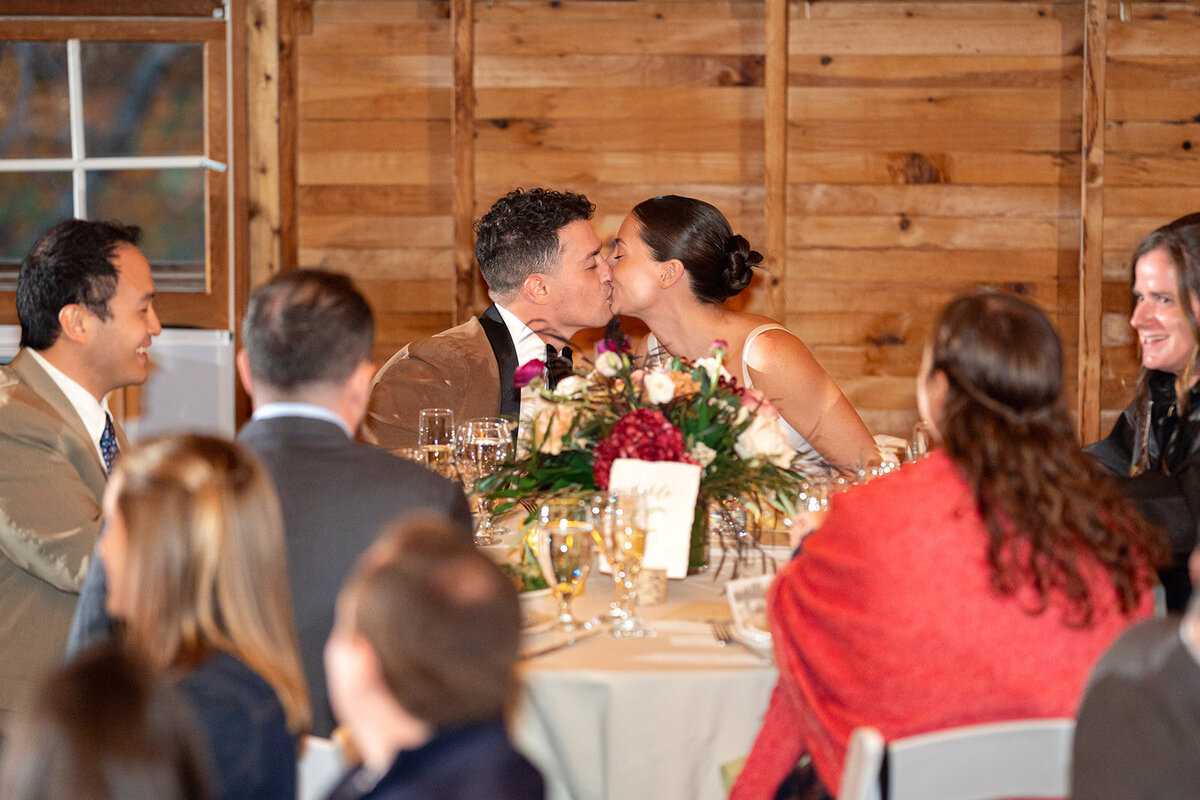 20-couple-kiss-barn-reception-upsate-new-york