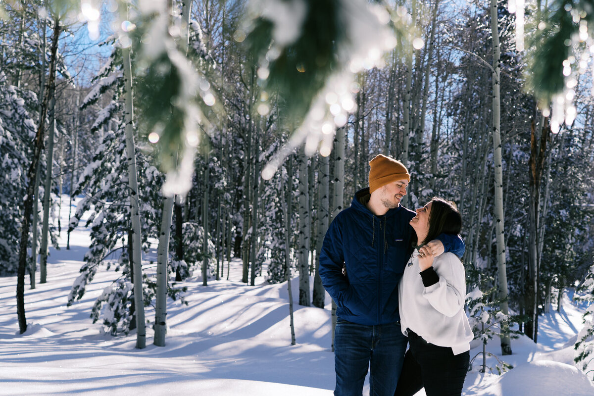 engaged-couple-snow-winter-aspen-corner
