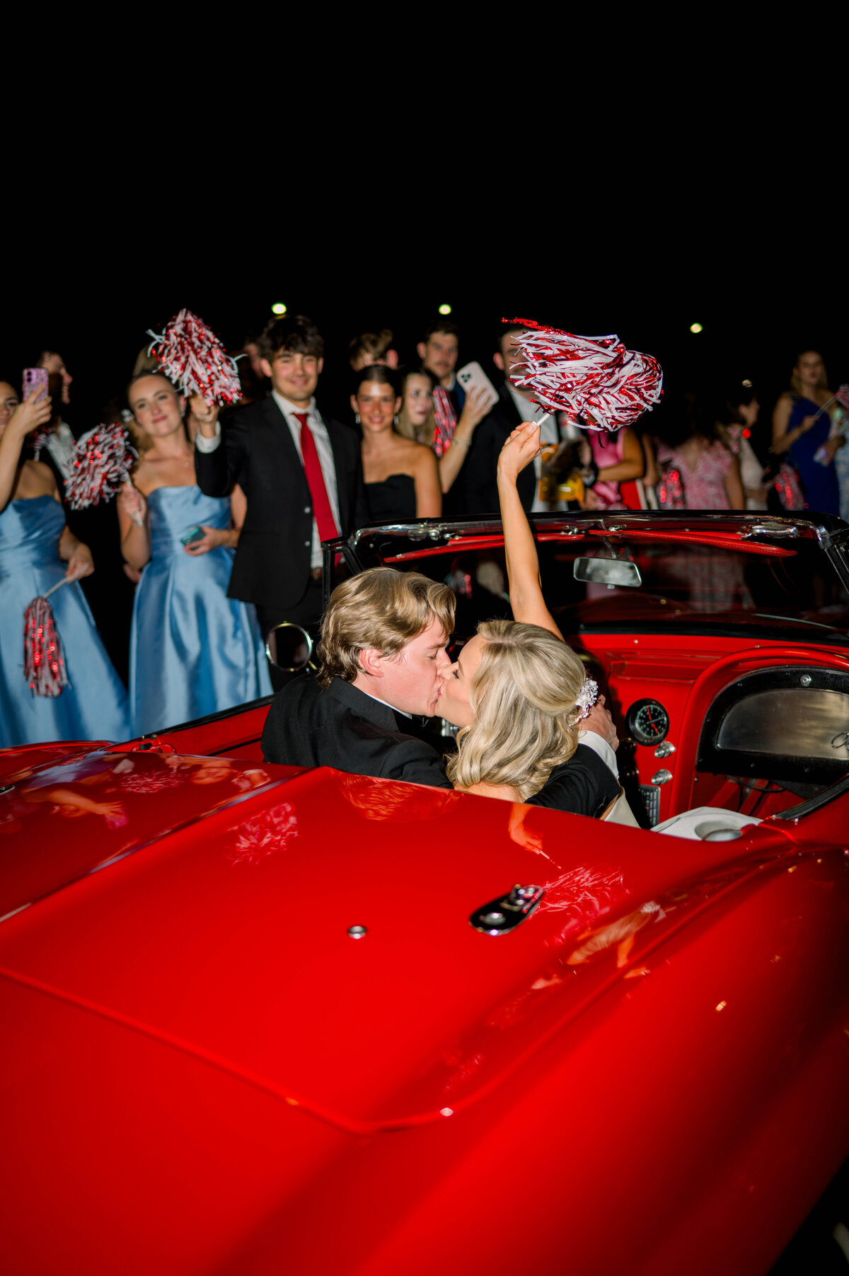 Couple sent off in red corvette from their Tuscaloosa Alabama wedding at University Club
