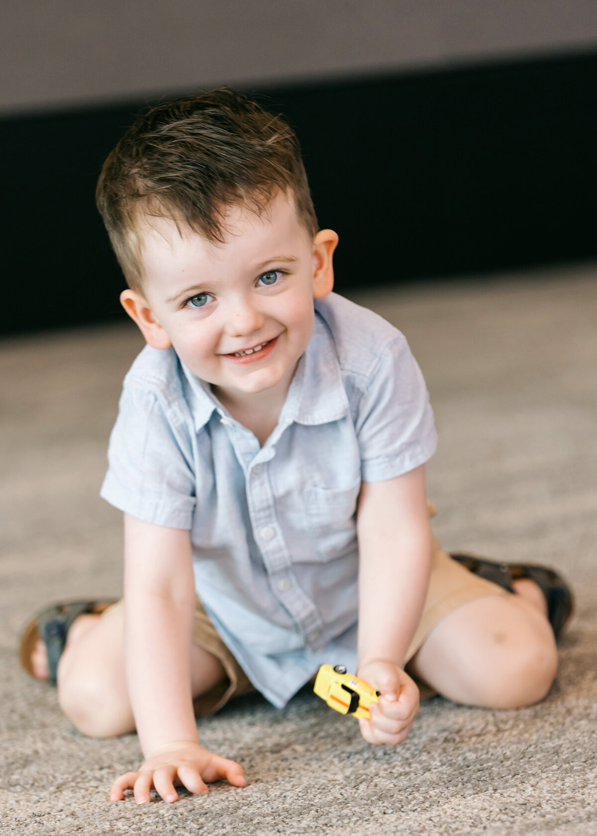 Little boy smiling at the Brisbane Registry Office 