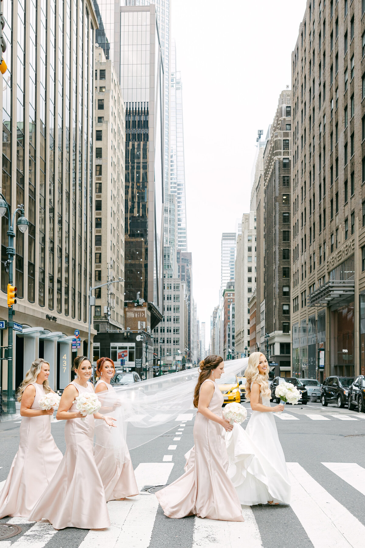 NYC Fine Art Wedding Photographer, New Yok Bridal Party crossing streets, NYc Editorial Documentary Wedding Photographer