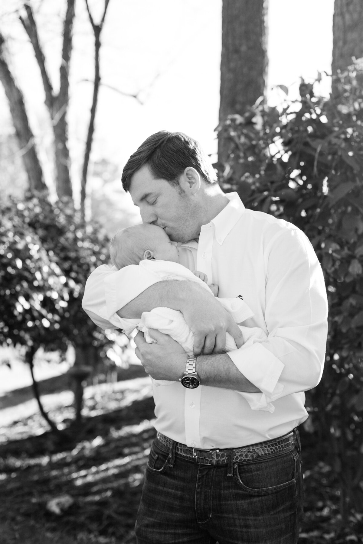 Dad Holding Baby Boy Newborn Photo