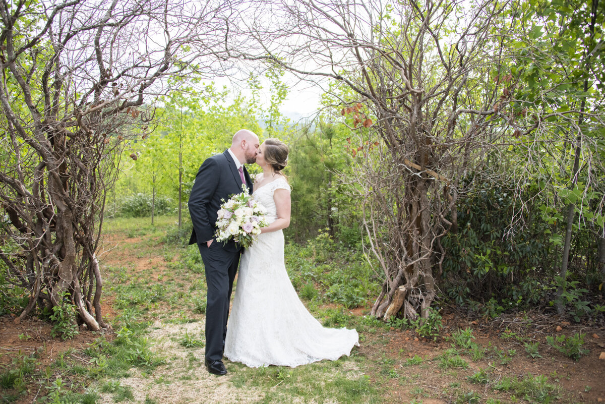 Couple kissing at Something Blue wedding venue
