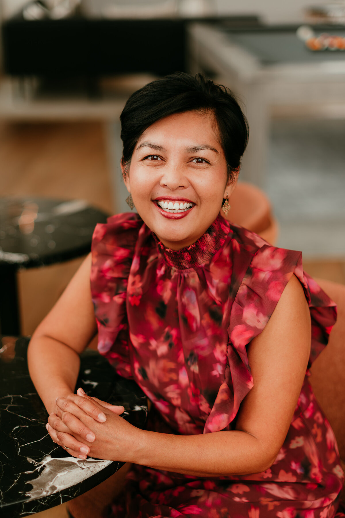 On-location team headshots for a Twin Cities business with cohesive styling and consistent lighting.