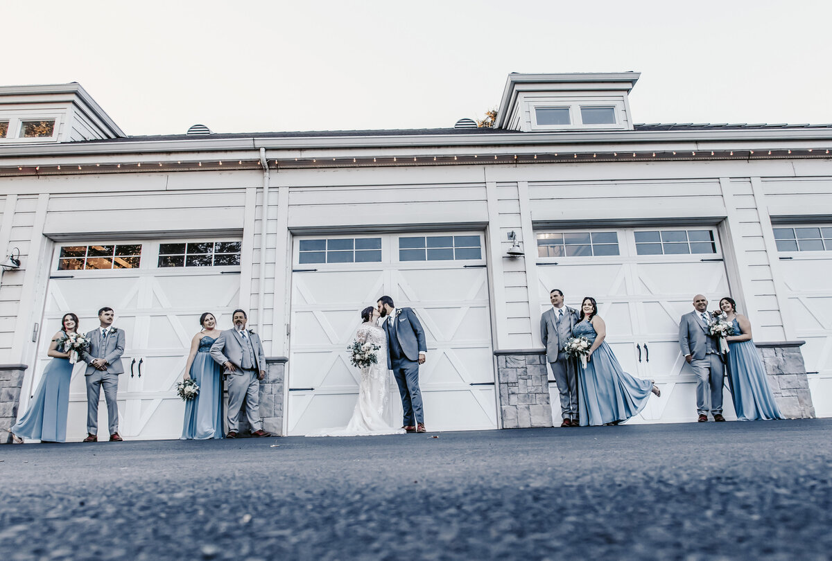 bridal party shot with cool doors
