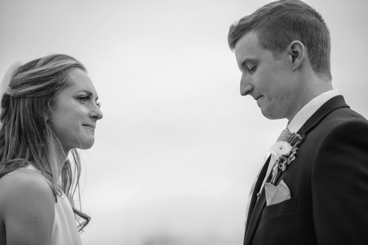 Bride and Groom cry happy tears during their vows of Newport wedding.