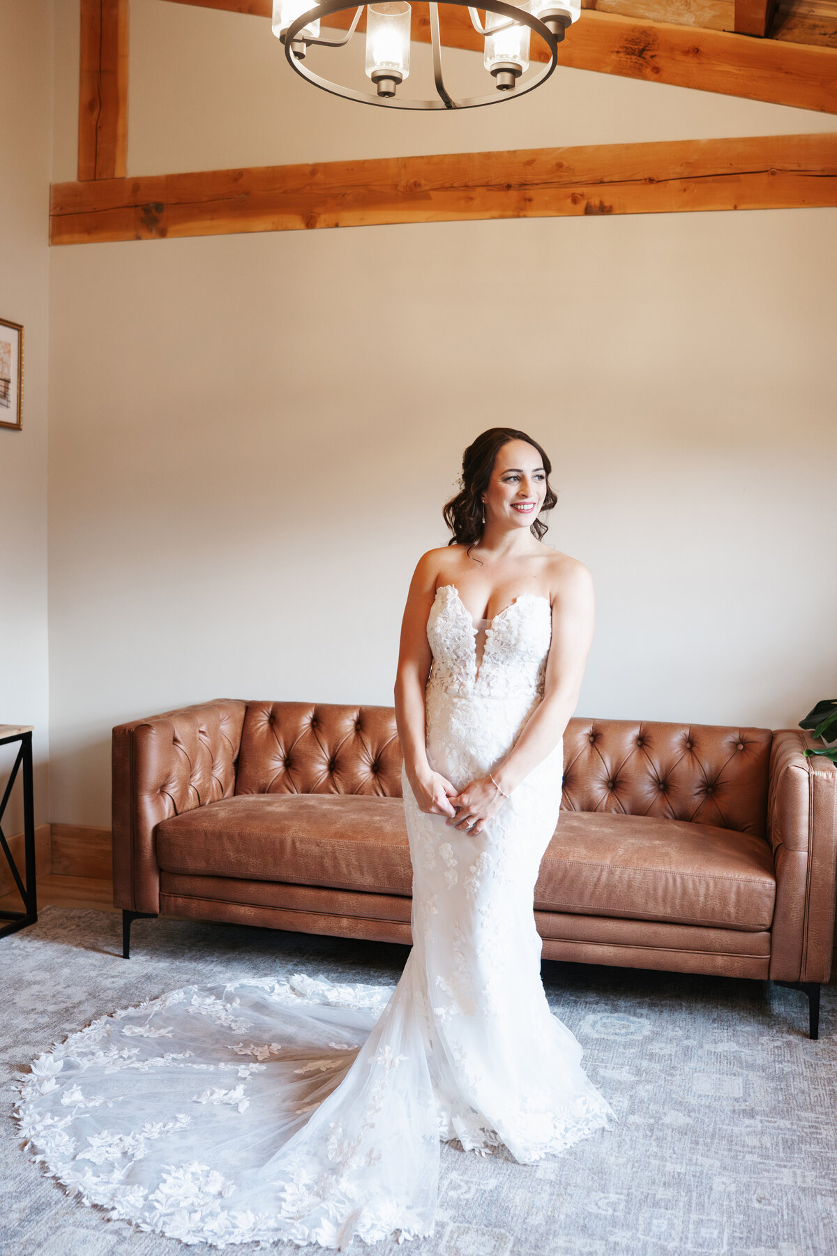 Bride getting ready with her bridesmaids on the morning of her wedding