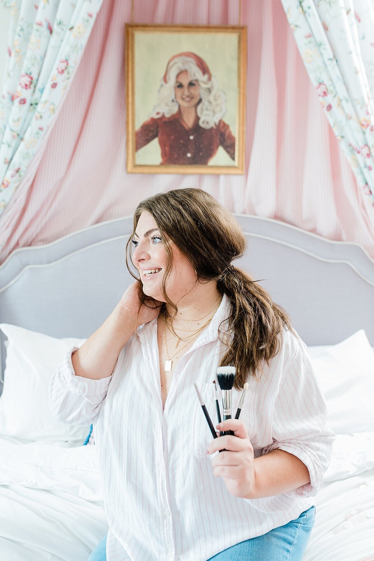 A hair and makeup artists branding photos at the Graduate Hotel in Nashville Tennessee by Dolly DeLong Photography