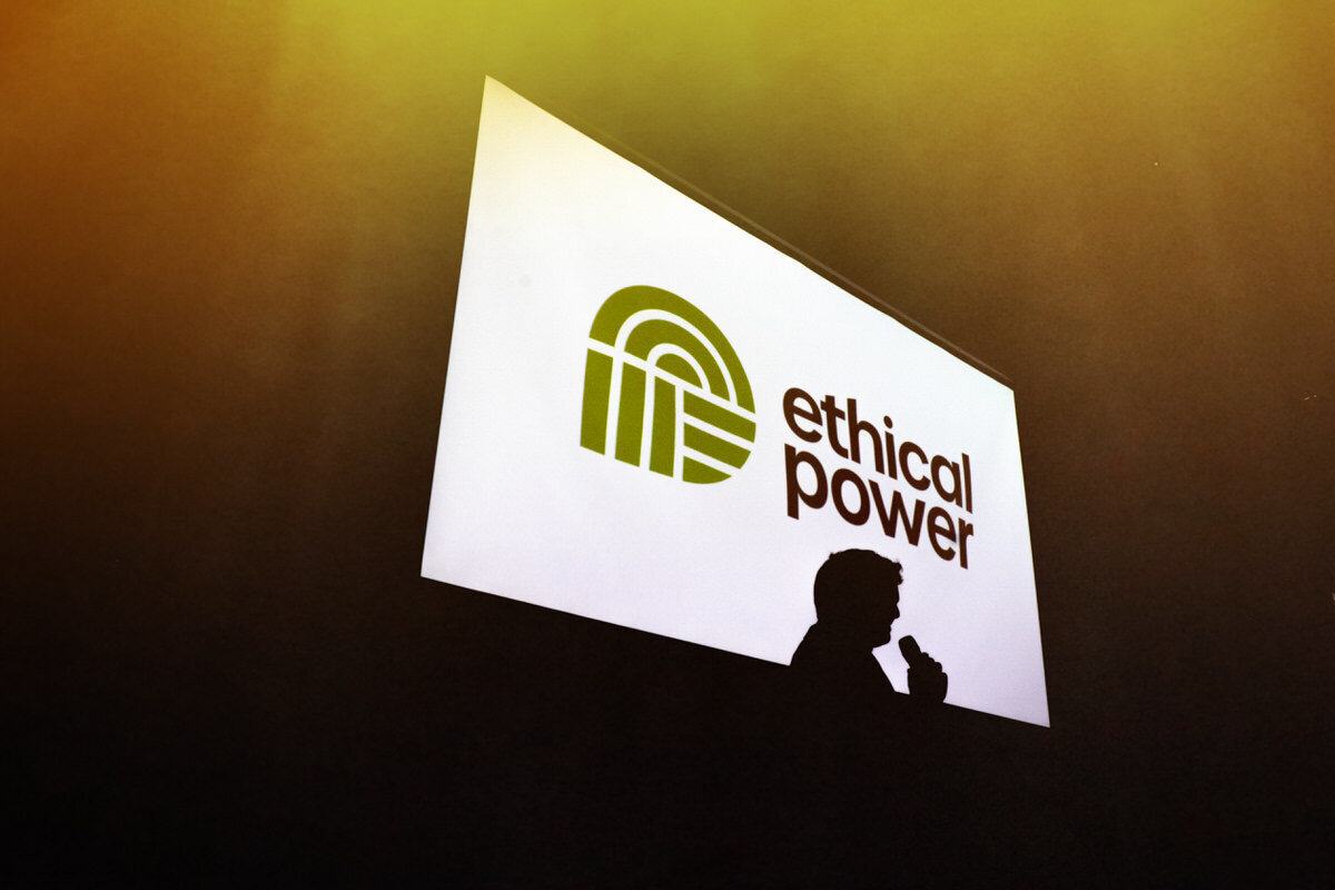 photograph of a masseuse with clientt taken through a doorway of her studio