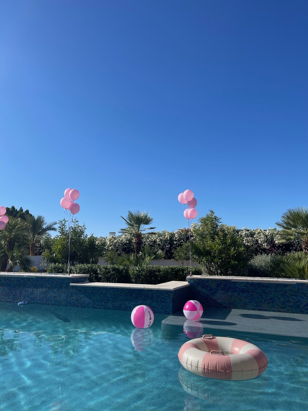 Vibrant and fun 'Last Splash' pool party aesthetic in Scottsdale.
