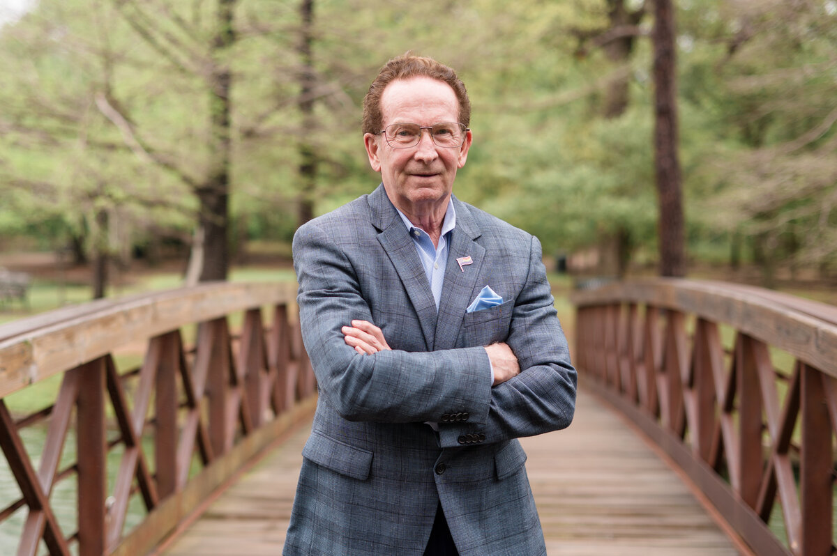 Folded-arm confident man during personal branding session by Houston photographer