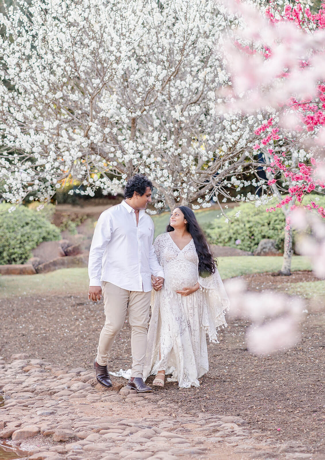 Embrace maternity joy as a Sri Lankan couple anticipates her baby's arrival amidst Brisbane's Japanese garden