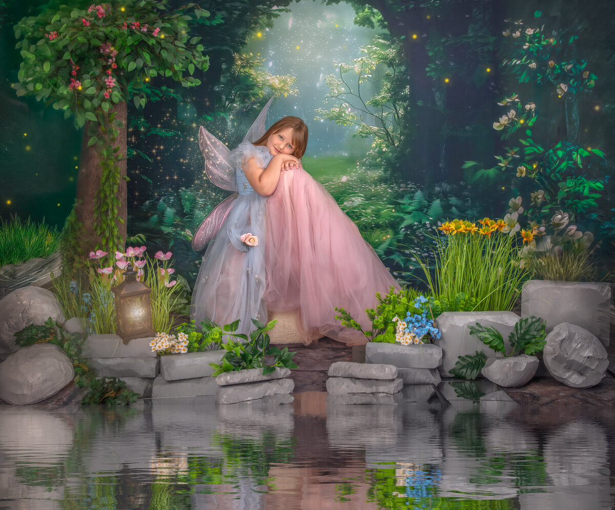Capture the magic with our delicate fairy portrait — a whimsical image of a tiny fairy perched gently on a handcrafted toadstool. Perfect for fantasy-inspired children's photography sessions in Ottawa.

