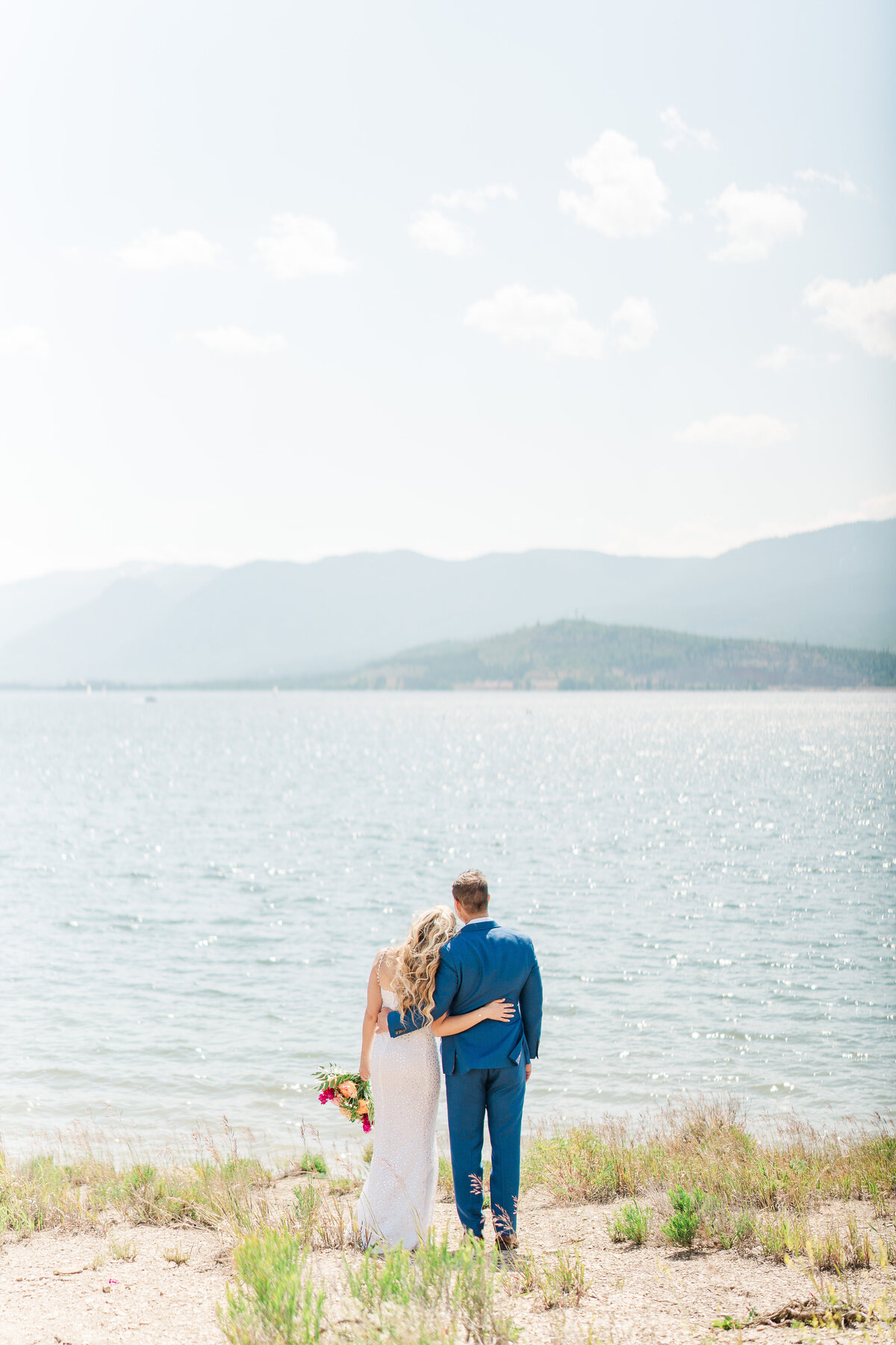 Lake Dillion Reservoir Colorado Elopement Wedding Mountain View Summer Pink and Orange Florals Sparkly Dress Light and Airy Elena Spraguer Photography0119