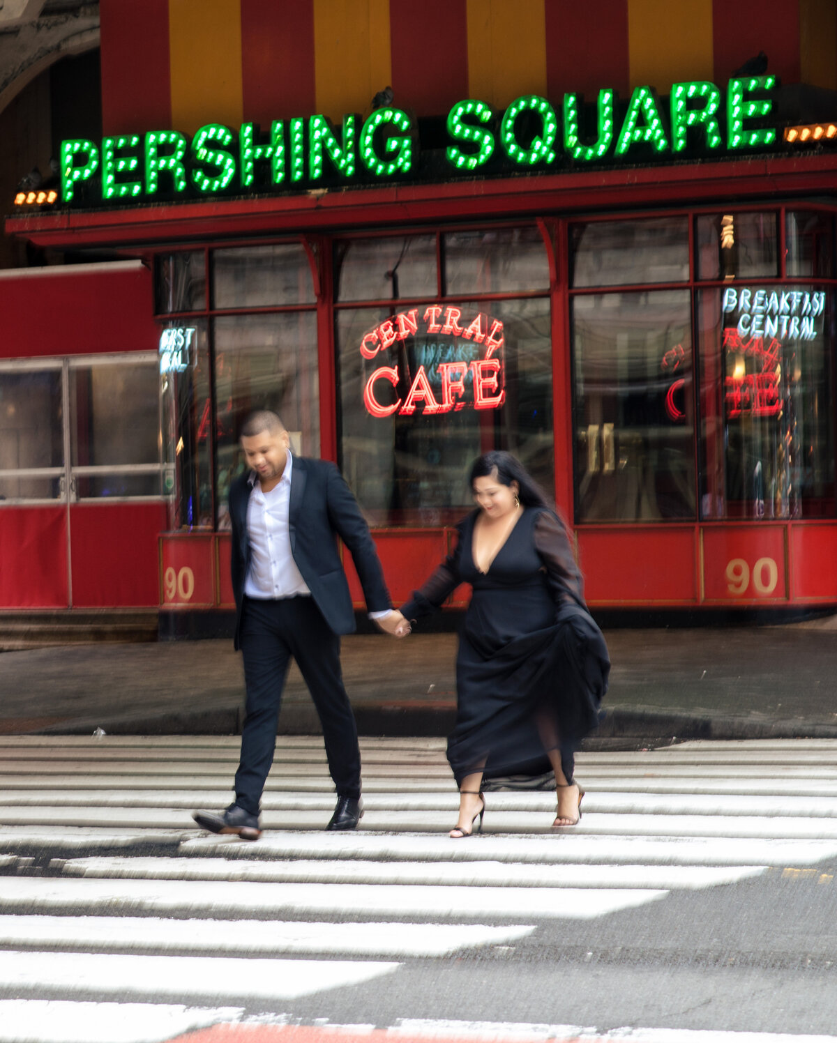 NYC-blurry-photo-of-Engaged-couple-crossing-crosswalk-GCS-1
