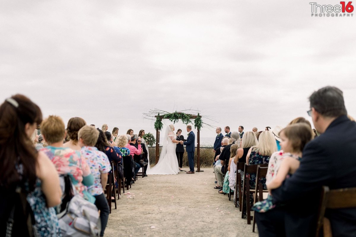 Historic Cottage beach wedding ceremony in action