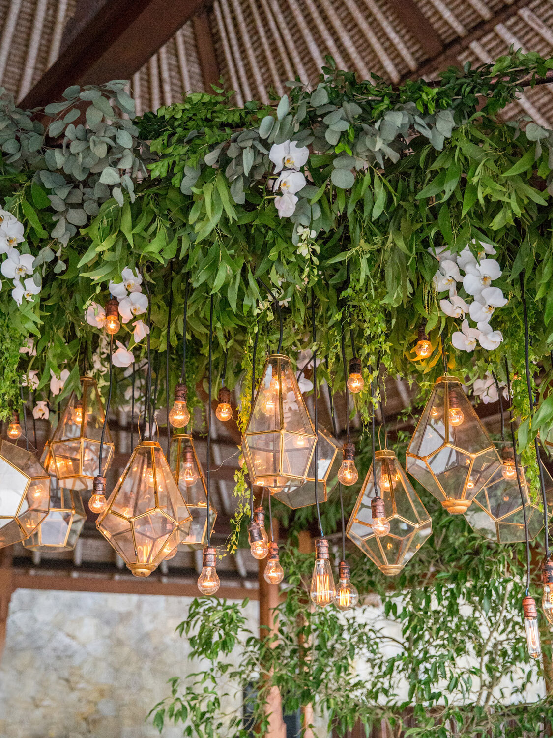 destination-wedding-bali-amankila-lush-chandelier-draped-lanterns-greenery